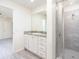 This bathroom features granite counters, a vanity, and a tiled stand-up shower at 3124 N Chamberlain Blvd, North Port, FL 34286
