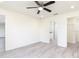 This bedroom features stylish floors and an ensuite bathroom with a walk-in closet at 3124 N Chamberlain Blvd, North Port, FL 34286