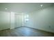 Bedroom with wood flooring featuring closet, window, and recessed lighting at 5907 Sussex Ct, Tampa, FL 33615