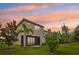 View of the backyard and the home at 8661 Daydream St, Sarasota, FL 34238