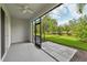 This covered patio overlooks the yard at 8661 Daydream St, Sarasota, FL 34238