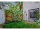 Enclosed backyard featuring lush greenery and a private outdoor space at 5641 Ashley Oaks Dr # 39, Tampa, FL 33617