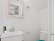 Bright bathroom with white vanity, sink, and toilet at 5641 Ashley Oaks Dr # 39, Tampa, FL 33617