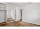 Bedroom with mirrored closet doors and neutral carpet at 5641 Ashley Oaks Dr # 39, Tampa, FL 33617