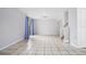 Spacious living area with tile floors, staircase, and lots of natural light at 5641 Ashley Oaks Dr # 39, Tampa, FL 33617