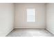 Bright, airy bedroom with gray carpeting and a window for natural light at 6204 Camino Dr, Apollo Beach, FL 33572
