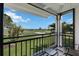 Relaxing balcony with seating and a scenic golf course view at 6210 Sun Blvd # 206, St Petersburg, FL 33715