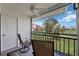 Relaxing balcony with seating and view overlooking well-manicured grounds at 6210 Sun Blvd # 206, St Petersburg, FL 33715