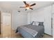 Cozy bedroom featuring a Murphy bed, ceiling fan, and neutral color palette at 6210 Sun Blvd # 206, St Petersburg, FL 33715