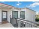 Charming condo exterior with a welcoming entrance door and bronze window frames at 6210 Sun Blvd # 206, St Petersburg, FL 33715