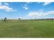 Breathtaking golf course views, surrounded by lush greenery, palm trees, and serene water features at 6210 Sun Blvd # 206, St Petersburg, FL 33715