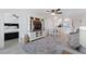 Inviting living area seamlessly connected to dining and kitchen, creating an open and airy space at 6210 Sun Blvd # 206, St Petersburg, FL 33715