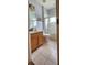 Bathroom featuring a tiled floor, vanity, toilet and tub shower combo at 1829 Mira Lago Cir, Ruskin, FL 33570