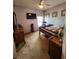A bedroom features lilac colored walls, a ceiling fan, and vintage furniture at 1829 Mira Lago Cir, Ruskin, FL 33570