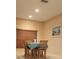 Cozy dining area with natural light, table setting, and neutral color palette at 1829 Mira Lago Cir, Ruskin, FL 33570