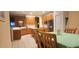 Well-lit kitchen boasts stainless appliances, island, and stylish counter tops at 1829 Mira Lago Cir, Ruskin, FL 33570
