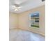 Bedroom featuring neutral walls and tile floors at 14256 Salvatierra Ln, Port Charlotte, FL 33981