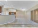 Open-concept living room featuring tiled flooring and sliding glass door at 14256 Salvatierra Ln, Port Charlotte, FL 33981