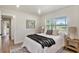 Bright bedroom featuring a comfortable bed, soft pillows, and a cozy blanket at 14050 Blackjack Rd, Dover, FL 33527