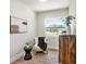 Cozy room featuring comfortable seating, stylish decor, and abundant natural light from a nearby window at 14050 Blackjack Rd, Dover, FL 33527