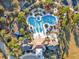 An aerial view of the resort-style pool and clubhouse featuring several amenities for the residents at 8506 Hunters Fork Loop, Ruskin, FL 33573