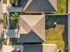 Aerial shot of roof, backyard, and driveway at 8506 Hunters Fork Loop, Ruskin, FL 33573
