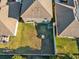 Aerial view of the backyard with seating and fire pit at 8506 Hunters Fork Loop, Ruskin, FL 33573