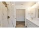 Stylish bathroom showcasing a walk-in shower, marble tile, and modern vanity at 19543 Midway Blvd, Port Charlotte, FL 33948