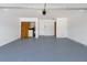 Spacious garage with ample storage, laundry hookups, and easy access to the home at 19543 Midway Blvd, Port Charlotte, FL 33948