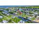 Waterfront homes lining the canals provide direct access to the bay in this scenic view at 24277 Treasure Island Blvd, Punta Gorda, FL 33955