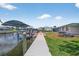 Dock featuring a boat lift and tiki hut perfect for enjoying waterfront living at 24277 Treasure Island Blvd, Punta Gorda, FL 33955