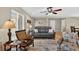 Open-concept living area with natural light and stylish furnishings at 24277 Treasure Island Blvd, Punta Gorda, FL 33955