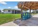 Relax in the shade under this tiki hut with seating overlooking the water at 24277 Treasure Island Blvd, Punta Gorda, FL 33955