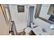 Clean bathroom featuring white subway tile in the shower/tub, tile accent, and updated fixtures at 6020 Illinois Ave, New Port Richey, FL 34653