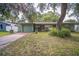 Charming single-story home with attached garage and mature landscaping at 101 N Nimbus Ave, Clearwater, FL 33765