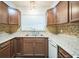 Kitchen features neutral countertops and ample storage space at 101 N Nimbus Ave, Clearwater, FL 33765
