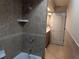 Cozy bathroom featuring tiled shower and tub, with a view of the vanity and toilet room at 141 Angol St, Punta Gorda, FL 33983