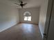 Bedroom featuring an arched window and neutral walls at 141 Angol St, Punta Gorda, FL 33983