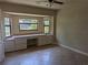 Bedroom featuring a built-in desk with views to the pool at 141 Angol St, Punta Gorda, FL 33983