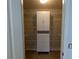 Walk-in closet with adjustable shelving and a built-in storage cabinet at 141 Angol St, Punta Gorda, FL 33983