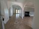 Inviting entryway featuring arched doorways, tile flooring, and decorative accents throughout the open floor plan at 141 Angol St, Punta Gorda, FL 33983