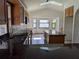 Well-lit kitchen featuring modern appliances, an island, a breakfast nook, and skylight for natural light at 141 Angol St, Punta Gorda, FL 33983