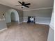Living room with tile floors, stylish fireplace, and an open layout perfect for entertaining and Gathering gatherings at 141 Angol St, Punta Gorda, FL 33983