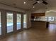 Bright room with backyard pool view, complemented by a stylish bar, perfect for entertaining at 141 Angol St, Punta Gorda, FL 33983