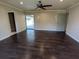 Open-plan living room with access to a patio and adjacent walk-in closet at 141 Angol St, Punta Gorda, FL 33983