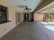 Covered pool-side patio that boasts ample lounge space, ceiling fans and a convenient serving bar at 141 Angol St, Punta Gorda, FL 33983