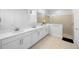 Bright bathroom with double vanity, granite countertop, and walk-in shower, offering a spa-like experience at 28761 Sweet Persimmon Dr, Wesley Chapel, FL 33543