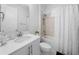 Pristine bathroom featuring a bright vanity with a white counter, a shower over the tub, and modern fixtures at 28761 Sweet Persimmon Dr, Wesley Chapel, FL 33543