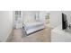 Cozy bedroom features a comfortable bed, side tables, and neutral colors for a relaxing atmosphere at 28761 Sweet Persimmon Dr, Wesley Chapel, FL 33543