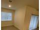 Cozy bedroom with hardwood floors and plenty of natural light at 10153 Wildcat St, Port Charlotte, FL 33981